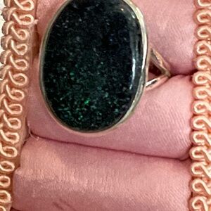 Elegant genuine black opal with green fluorescents SZ. 9.5